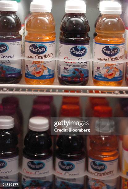 Bottles of Ocean Spray Cran-Raspberry juice are in a refrigerator case in a store in Galveston, Texas, June 8, 2004. Ocean Spray Cranberries Inc.,...