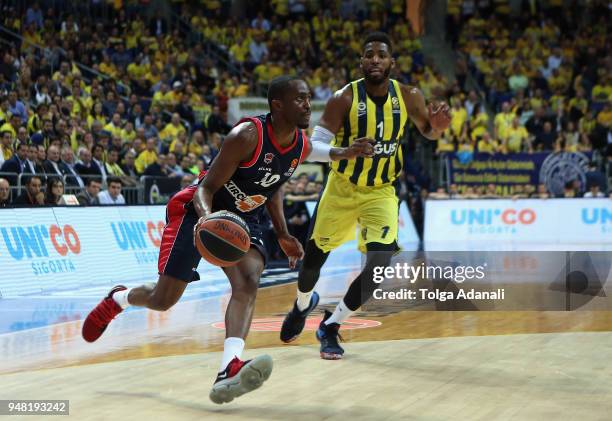 Rodrigue Beaubois, #10 of Kirolbet Baskonia Vitoria Gasteiz in action with Jason Thompson, #1 of Fenerbahce Dogus during the Turkish Airlines...