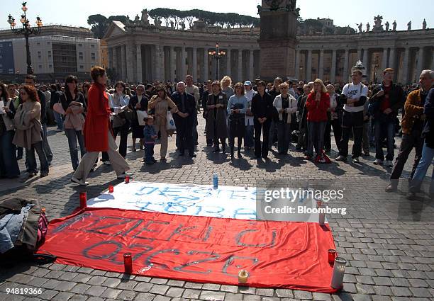 Polish flag with messages of good wishes for the Pope is seen in front of St. Peter's Cathedral in Vatican City Saturday, April 2, 2005. Pope John...