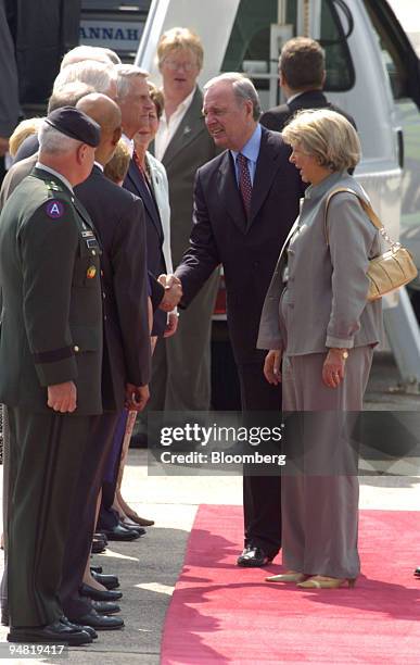 Canadian Prime Minister Paul Martin and his wife Sheila are greeted upon their arrival to Hunter Army Airfield, Georgia on June 8, 2004 for the...