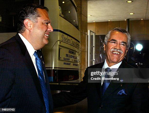 Energy Secretary Spencer Abraham, left, poses with Saudi oil minister Ali al-Naimi at the 9th International Energy Forum in Amsterdam, The...