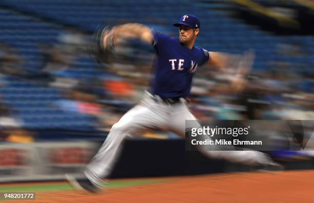 Cole Hamels of the Texas Rangers pitches during a game against the Tampa Bay Rays at Tropicana Field on April 18, 2018 in St Petersburg, Florida.