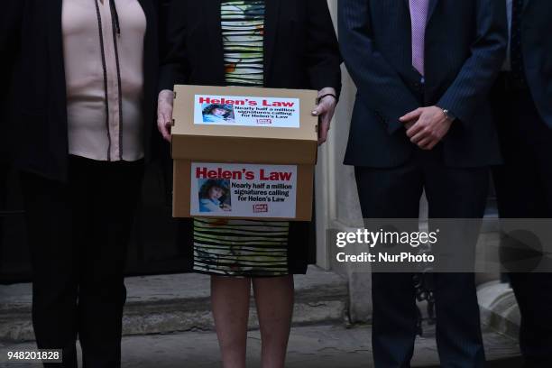 Family of Helen McCourt, who was murdered in 1988, bring a box to Downing Street with a petition to Introduce Helens Law where hiding a body becomes...