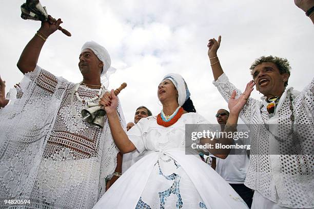 Devotees of the afro-Brazilian sea-goddess Yemonja celebrate her on Copacabana beach in Rio de Janeiro, Brazil, December 29, 2005. These New Year...