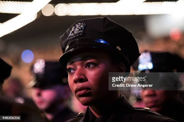 The newest members of the New York City Police Department attend their police academy graduation ceremony at the Theater at Madison Square Garden,...
