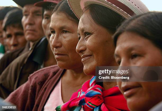 Aymara women wait in line to cast their votes for president in the tropical region of Chapare, Bolivia, Sunday, December 18, 2005. Evo Morales, the...