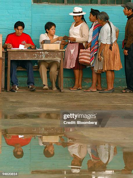 Aymara women cast their vote for president in the tropical region of Chapare, Bolivia, Sunday, December 18, 2005. Evo Morales, the Bolivian...