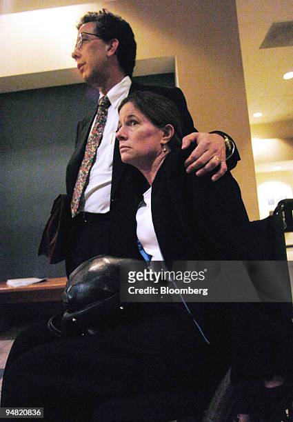 Benetta Buell-Wilson, right, shares a moment with her husband Barry, at San Diego Superior court on Thursday, June 3, 2004 in California. Ford Motor...
