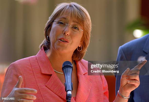 Chile's President-elect Michelle Bachelet speaks to the press at her home in Las Condes, eastern Santiago, upon a breakfast meeting with President...