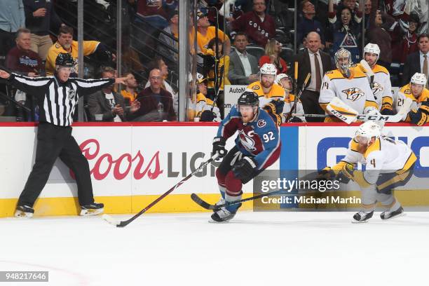Gabriel Landeskog of the Colorado Avalanche skates against Ryan Ellis of the Nashville Predators in Game Three of the Western Conference First Round...