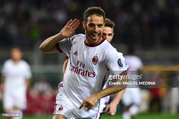 Milan's midfielder Giacomo Bonaventura celebrates after opening the scoring during the Italian Serie A football match Turin vs AC Milan at the...