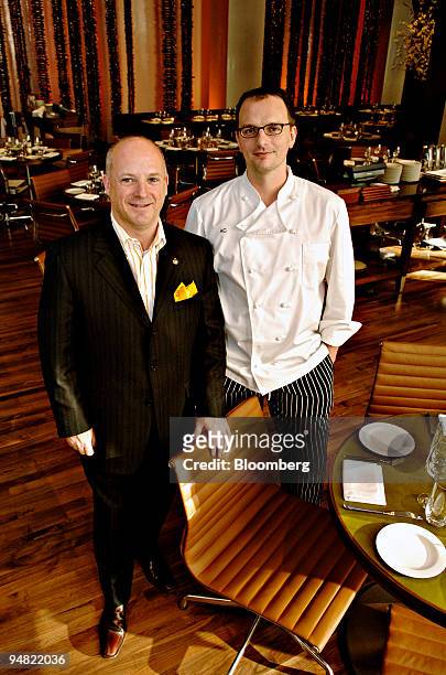 Chef Andrew Carmellini and Chris Palikuca, chief operating officer of A Voce restaurant, pose for a photograph in the A Voce dining room Friday,...