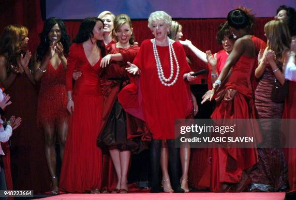 New York, NY - FEB. 3, 2006: Singer Amerie, actress Lindsay Lohan, singer Thalia and actress Elaine Strich at the runway finale at the Heart Truth's...