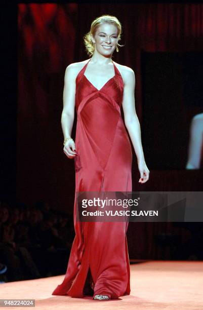 New York, NY - FEB. 3, 2006: Singer LeAnn Rimes walks the runway at the Heart Truth's Red Dress show during the Fall/Winter 2006 Olympus Fashion Week...