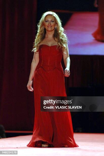 New York, NY - FEB. 3, 2006: Singer Lee Ann Womack walks the runway at the Heart Truth's Red Dress show during the Fall/Winter 2006 Olympus Fashion...