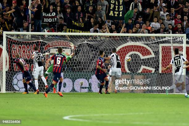 Juventus' Alex Sandro scores during the Italian Serie A football match FC Crotone vs Juventus on April 18, 2018 at the Ezio Scida stadium in Crotone....