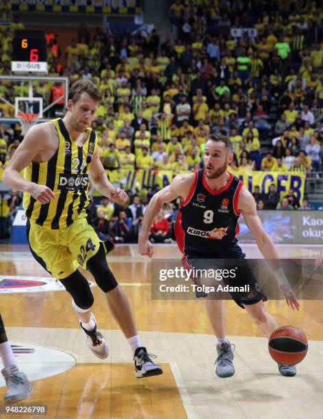 Marcelinho Huertas, #9 of Kirolbet Baskonia Vitoria Gasteiz in action with Jan Vesely, #24 of Fenerbahce Dogus during the Turkish Airlines Euroleague...
