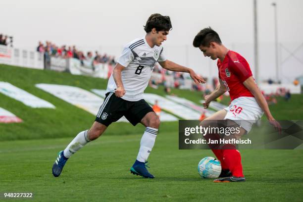 Elias Abouchabaka of Germany and Fabian Markl of Austria fight for the ball during the international friendly match between U18 Austria and U18...