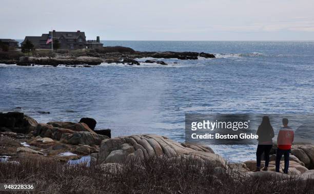 Christine and Rich Benjes take in the view of the Bush family home at Walker's Point in Kennebunkport, ME on April 18, 2018. The couple, from Olathe,...