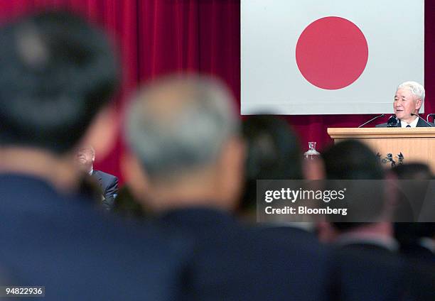 Bank of Japan Governor Toshihiko Fukui speaks to guests at a Japan Chamber of Commerce and Industry meeting at the Imperial Hotel in Tokyo Thursday,...