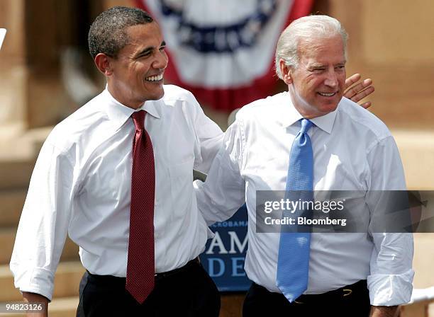 Barack Obama, U.S. Senator from Illinois and Democratic presidential candidate, left, introduces Joe Biden, a Democratic senator from Delaware, as...