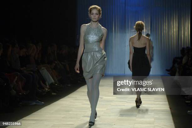 Model walks the runway at the Zac Posen Fall 2006 fashion show during Olympus Fashion Week, held at Bryant Park in New York, NY, on Thursday February...