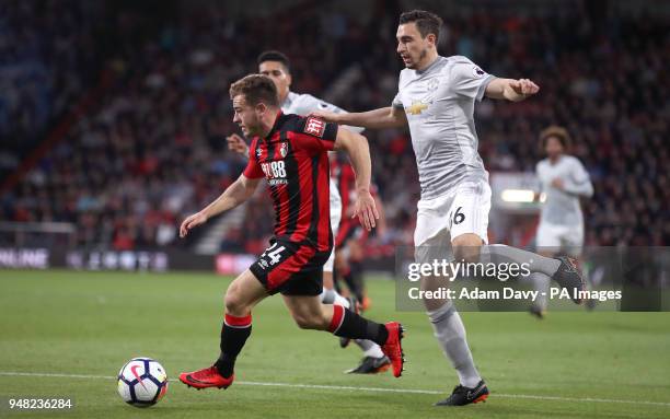 Bournemouth's Ryan Fraser and Manchester United's Matteo Darmian battle for the ball during the Premier League match at the Vitality Stadium,...