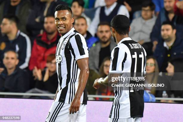 Juventus Alex Sandro celebrates a goal with Douglas Costa during the Italian Serie A football match FC Crotone vs Juventus on April 20, 2018 at the...