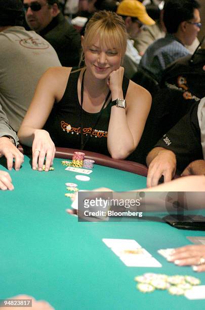 Gambler Laura Prepow drops her poker face and smiles over her winning hand during the World Series of Poker at Binion's Horseshoe Hotel & Casino in...