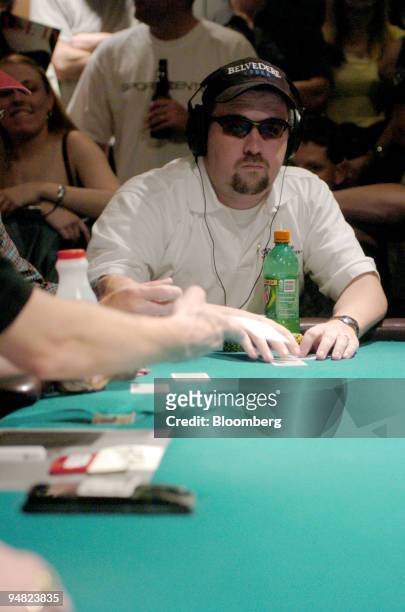 Chris Moneymaker, the 2003 winner, takes a card during the World Series of Poker at Binion's Horseshoe Hotel & Casino in Las Vegas, Nevada, on...