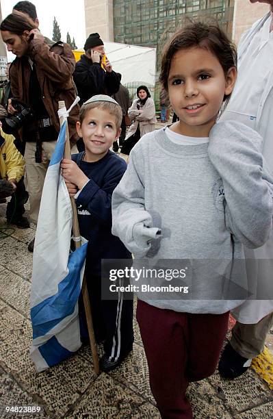 Hila right, and her brother Gilad left, skipped school and arrived at Hadassah Medical Center in Jerusalem, Israel to deliver a get well letter they...