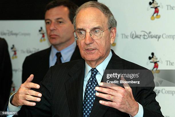 Walt Disney Company Chairman George Mitchell speaks to reporters after a meeting with officials from seven pension funds to discuss Disney's...
