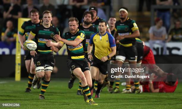Tom Kessell of Northampton passes the ball during the Mobbs Memorial match between Northampton Saints and the British Army at Franklin's Gardens on...