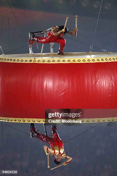 Dancers perform inside the National Stadium, also called the Bird's Nest, during the closing ceremony of the 2008 Beijing Olympics in Beijing, China,...