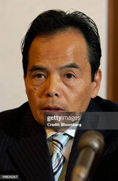 Aeon Co. President Motoya Okada speaks to reporters at a press briefing in Tokyo Thursday, March 10, 2005. Carrefour SA, Europe's largest retailer,...