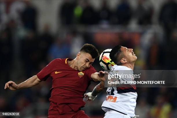 Roma's forward Stephan El Shaarawy and Genoa's forward Gianluca Lapadula go for a header during the italian Serie A football match Rome vs Genoa at...