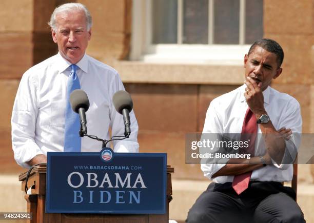 Barack Obama, U.S. Senator from Illinois and Democratic presidential candidate, right, listens to Joe Biden, a Democratic senator from Delaware,...