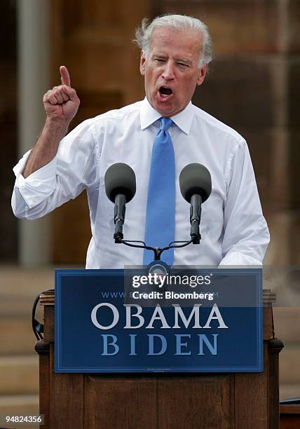 Joe Biden, a Democratic senator from Delaware, speaks to supporters after being introduced by Barack Obama, U.S. Senator from Illinois and Democratic...