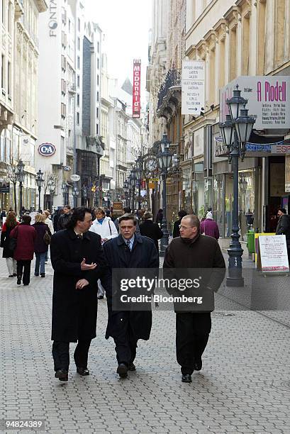 Businessmen seen in the Vaci utca, the pedestrian high street in downtown Budapest, Hungary, Wednesday, March 9, 2005.