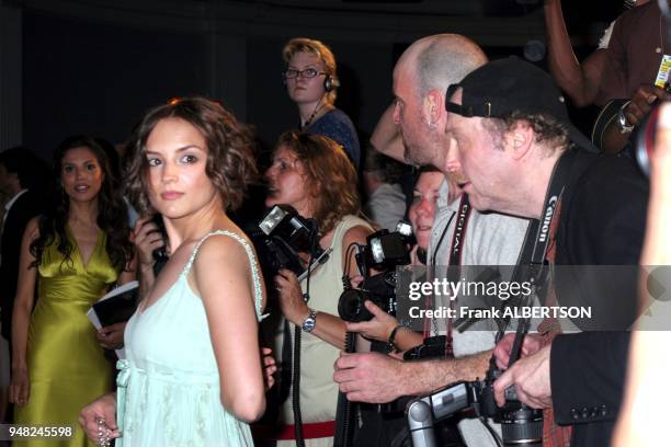 June 6, 2005 Photographers look for designer label on Rachel Leigh Cook's dress at the TNT premiere of "Into The West." Photo by Frank Albertson.
