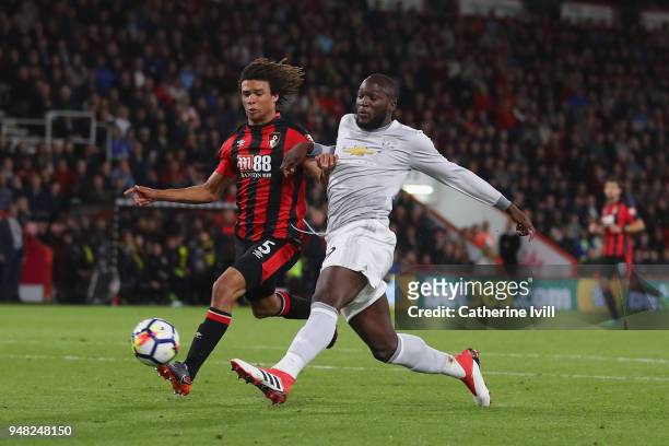Romelu Lukaku of Manchester United scores his sides second goal past Nathan Ake of AFC Bournemouth during the Premier League match between AFC...