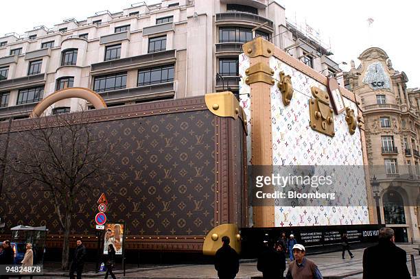 Giant luggage seen on the side of the Louis Vuitton store on the Champs-Elysee in Paris, France, Tuesday, March 8, 2005. LVMH Moet Hennessy Louis...