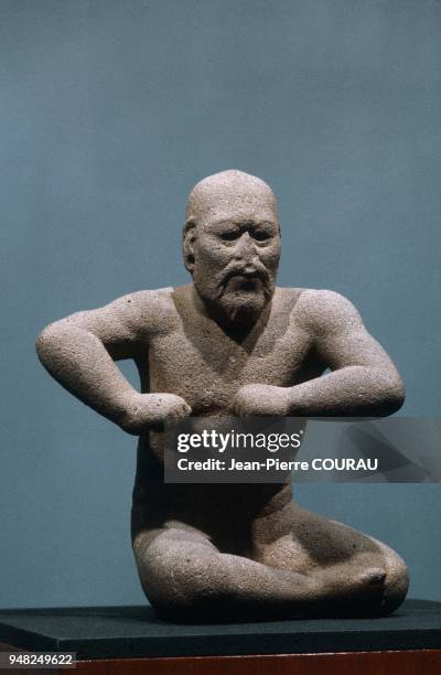 The WRESTLER, a 66cm high OLMEC sculpture dating from the Preclassic period and preserved at the National Museum of Anthropology in Mexico City,...