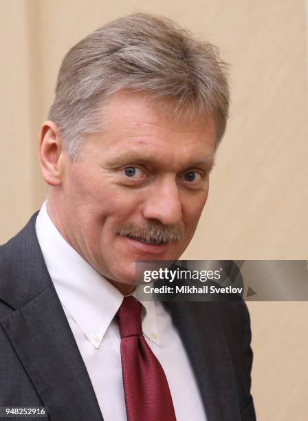 Russian Presidential Press Secretary Dmitry Peskov enters the hall during their weekly meeting with ministers of Russian Governmnet at Novo-Ogaryovo...