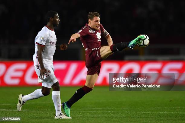 Andrea Belotti of Torino FC controls the ball against Cristian Zapata of AC Milan during the Serie A match between Torino FC and AC Milan at Stadio...