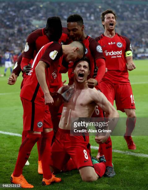 Luka Jovic of Frankfurt celebrate with his team mates after he scores the opening goal during the Bundesliga match between FC Schalke 04 and...