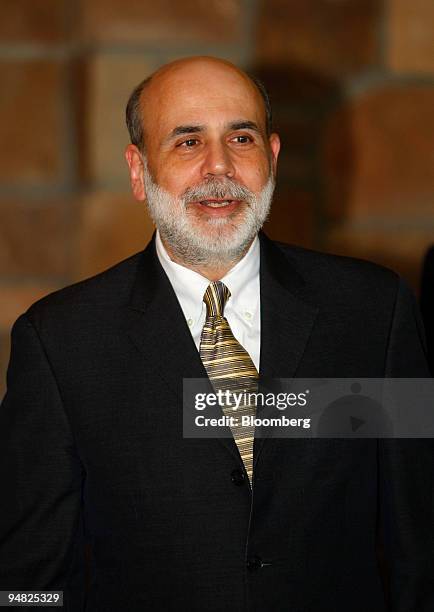 Ben S. Bernanke, chairman of the U.S. Federal Reserve, arrives to the opening reception and dinner to start the Federal Reserve Bank of Kansas City...