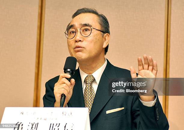 Nippon Broadcasting President Akinobu Kamebuchi speaks to reporters at a press briefing at the Imperial Hotel in Tokyo, Wednesday, February 23, 2005....
