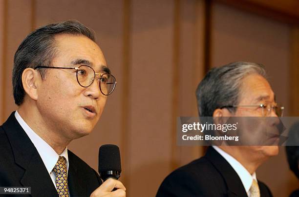 Nippon Broadcasting President Akinobu Kamebuchi, left, speaks to reporters at a press briefing while Fuji Television Chairman / CEO Hisashi Hieda,...