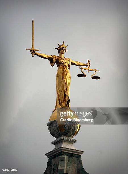 The Statue of Justice seen on the roof of the Central Criminal Court or Old Bailey in London, Thursday, January 6, 2006.